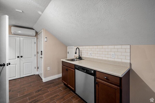 4876 S 1525 E, Ogden, UT 84403 - kitchen featuring wood tiled floor, dishwasher, a wall mounted air conditioner, decorative backsplash, and a sink