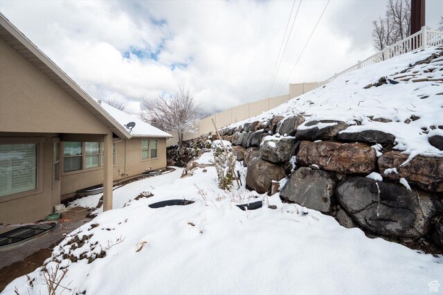 4876 S 1525 E, Ogden, UT 84403 - yard layered in snow featuring fence