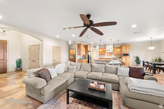 living room featuring ceiling fan