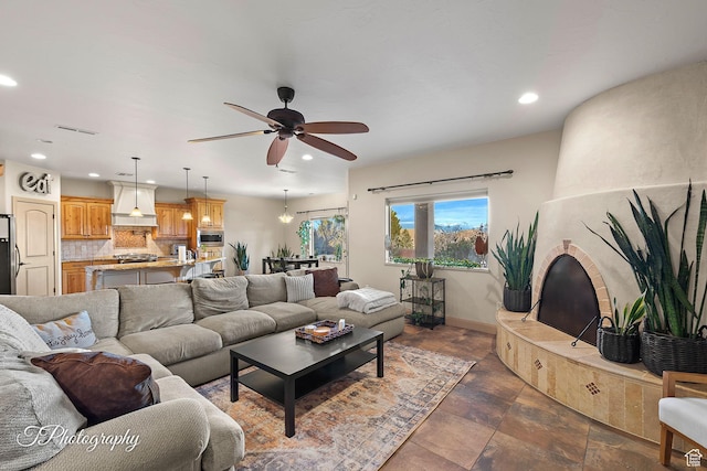 living room featuring ceiling fan