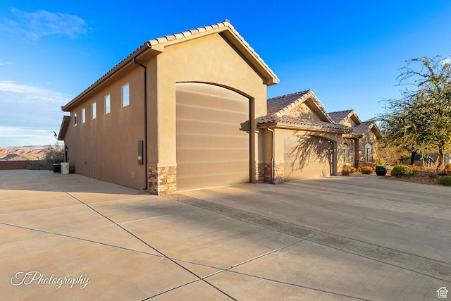 view of home's exterior with a garage