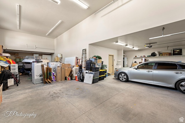 garage featuring a garage door opener and gas water heater