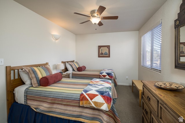 3253 E Fairway Loop, Moab, UT 84532 - bedroom featuring dark carpet and ceiling fan