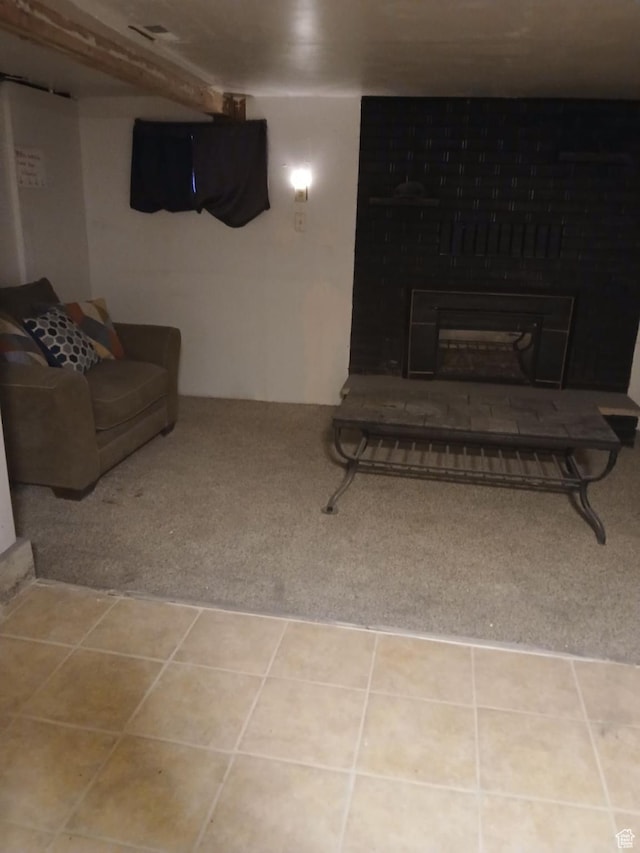 237 N 500 W, Vernal, UT 84078 - carpeted living room featuring a fireplace with raised hearth and tile patterned floors