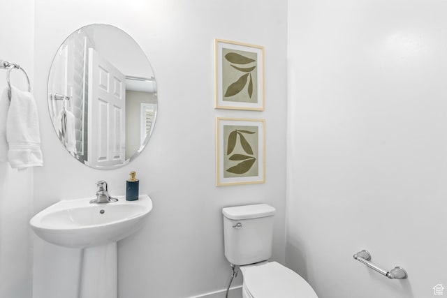 bathroom featuring toilet