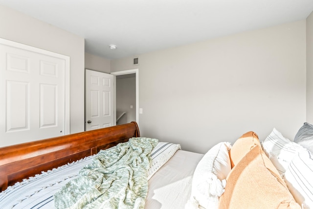 bedroom with visible vents