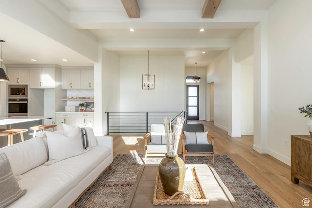 7277 W Hall Crossing Dr S, Herriman, UT 84096 - living room featuring light wood-type flooring, baseboards, beam ceiling, and recessed lighting