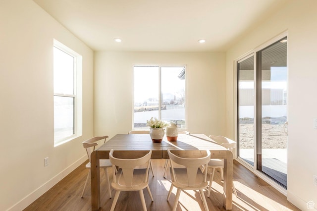 7277 W Hall Crossing Dr S, Herriman, UT 84096 - dining space with baseboards, recessed lighting, and wood finished floors