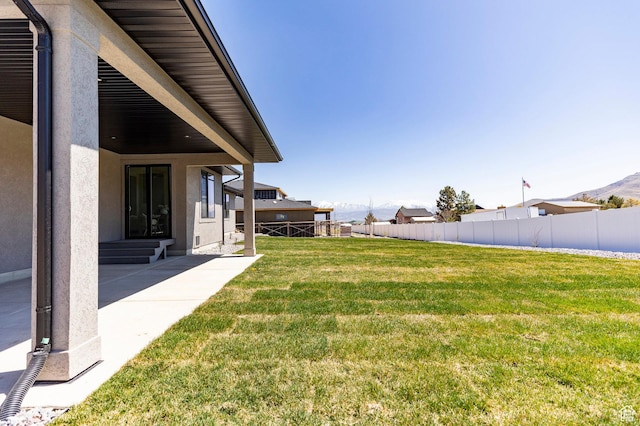 7277 W Hall Crossing Dr S, Herriman, UT 84096 - view of yard with entry steps, a patio area, and fence