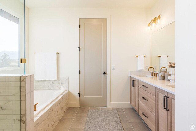 7277 W Hall Crossing Dr S, Herriman, UT 84096 - full bath featuring tile patterned flooring, double vanity, a bath, and a sink