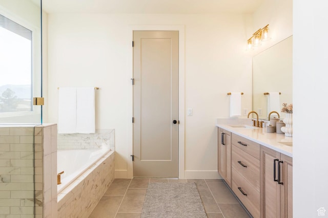 7277 W Hall Crossing Dr S, Herriman, UT 84096 - bathroom with double vanity, a bath, and tile patterned floors