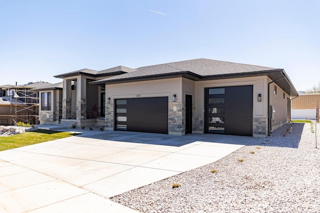 7277 W Hall Crossing Dr S, Herriman, UT 84096 - prairie-style home with driveway, stone siding, and an attached garage