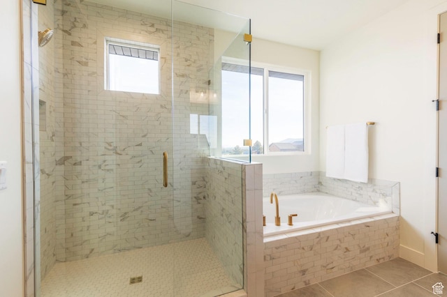 7277 W Hall Crossing Dr S, Herriman, UT 84096 - bathroom featuring a shower stall, a garden tub, and tile patterned flooring