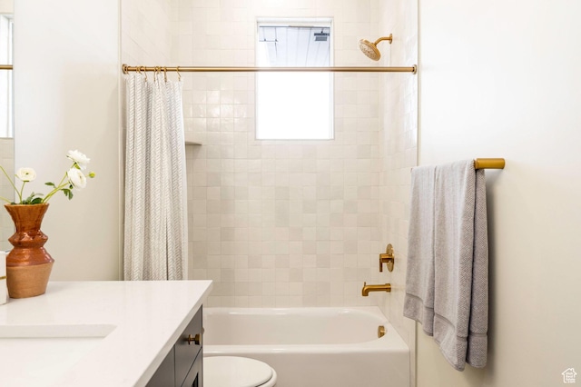 7277 W Hall Crossing Dr S, Herriman, UT 84096 - bathroom featuring shower / bath combo with shower curtain, vanity, and toilet