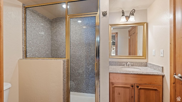 840 Bigler Ln W Unit 3023, Midway, UT 84049 - bathroom with toilet, a shower with shower door, and vanity
