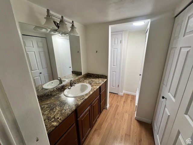 989 E Creekhill Ln S Unit 31, Midvale, UT 84047 - bathroom with vanity and wood-type flooring