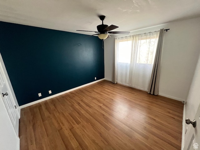989 E Creekhill Ln S Unit 31, Midvale, UT 84047 - spare room with ceiling fan and wood-type flooring
