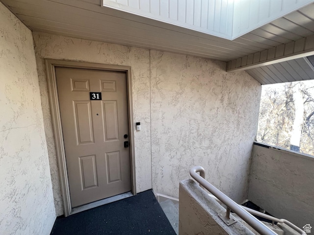 989 E Creekhill Ln S Unit 31, Midvale, UT 84047 - doorway to property with a balcony