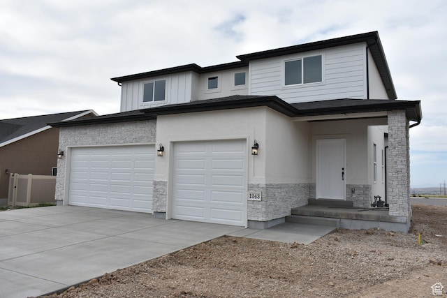 view of front of property with a garage