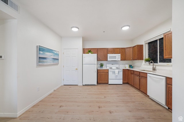 502 S 1040 E Unit 243, American Fork, UT 84003 - kitchen with white appliances, light hardwood / wood-style flooring, and sink