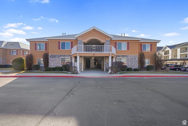 view of building exterior featuring a carport