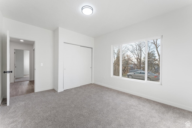 225 8th St, Ogden, UT 84404 - unfurnished bedroom with carpet floors and a closet