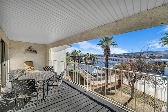 wooden terrace with a mountain view