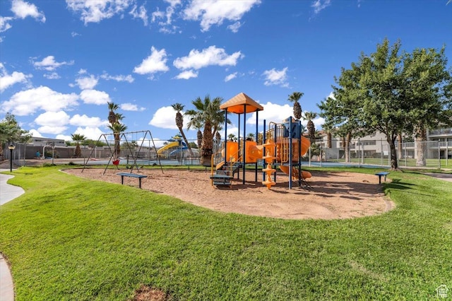 view of jungle gym with a yard