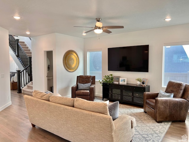 10052 Marigold Ln, Cedar Hills, UT 84062 - living room with light hardwood / wood-style floors, ceiling fan, and a wealth of natural light