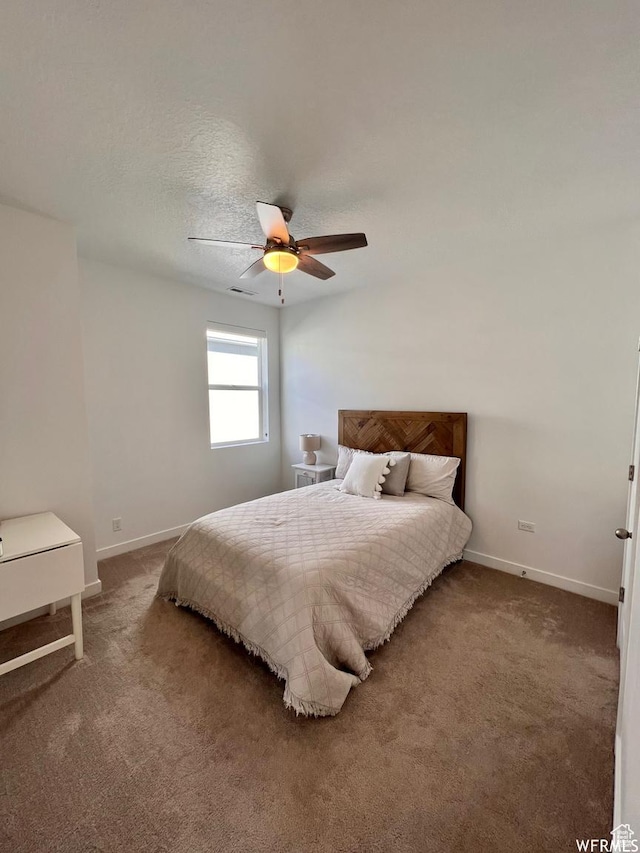 10052 Marigold Ln, Cedar Hills, UT 84062 - carpeted bedroom with a textured ceiling and ceiling fan