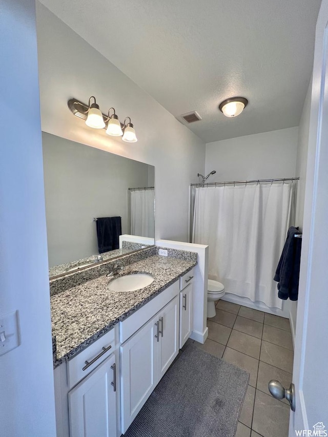 10052 Marigold Ln, Cedar Hills, UT 84062 - full bathroom featuring toilet, a textured ceiling, tile patterned flooring, shower / bath combination with curtain, and vanity