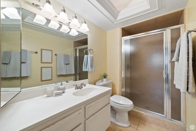 bathroom featuring toilet, tile patterned floors, an enclosed shower, vanity, and crown molding