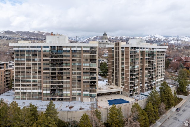 view of building exterior featuring a mountain view