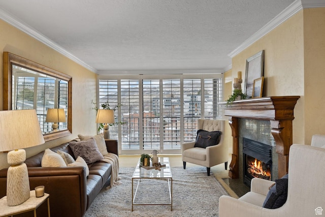 living room with a high end fireplace, a textured ceiling, and crown molding