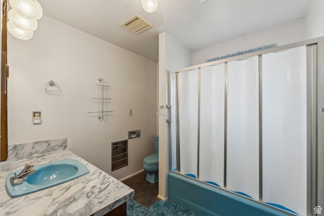 full bathroom with toilet, combined bath / shower with glass door, and vanity