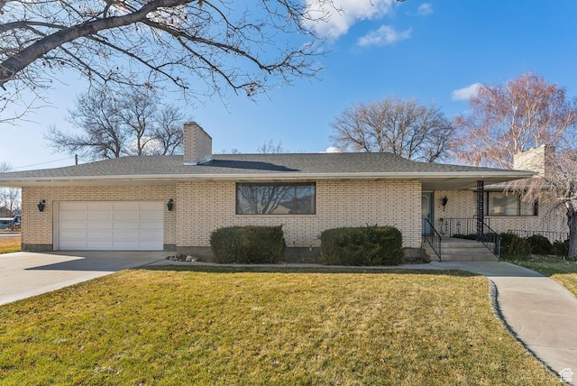 single story home featuring a front lawn and a garage