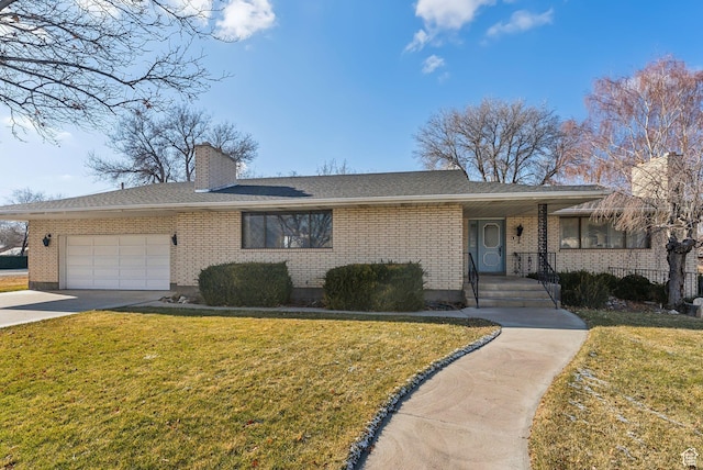 ranch-style house with a front yard and a garage
