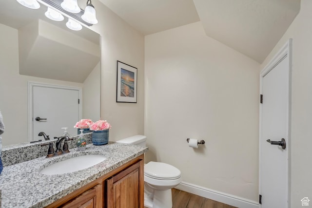 911 W 310 S, Pleasant Grove, UT 84062 - bathroom with toilet, wood-type flooring, and vanity