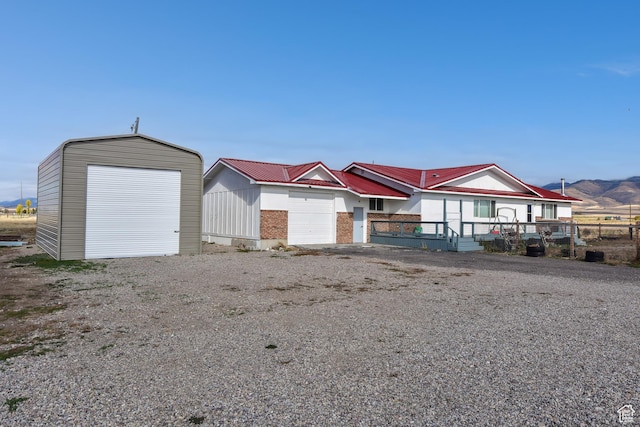 4752 E Max Rd, Downey, ID 83234 - exterior space with a garage and a mountain view