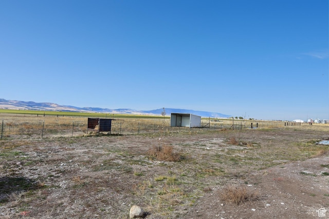 4752 E Max Rd, Downey, ID 83234 - view of yard featuring a rural view, a mountain view, and an outdoor structure