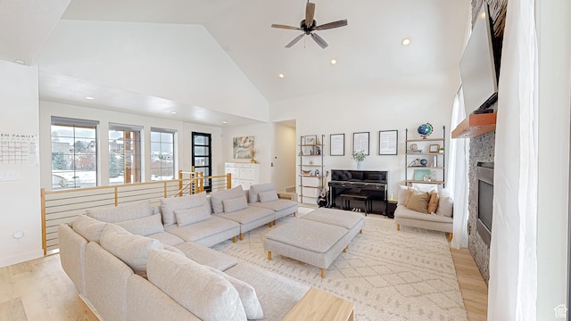 1244 N Washougal, Elk Ridge, UT 84651 - living area featuring high vaulted ceiling, ceiling fan, light wood-type flooring, a stone fireplace, and recessed lighting