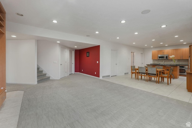 living room featuring light tile patterned flooring
