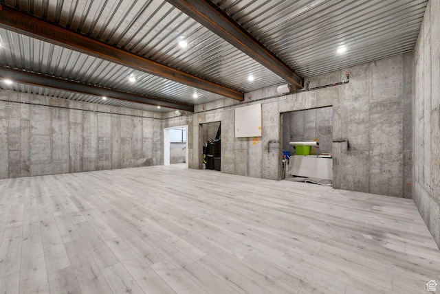 13599 S White Pony Rd W, Herriman, UT 84096 - empty room featuring beamed ceiling and light hardwood / wood-style floors