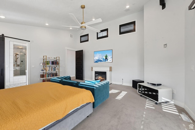 13599 S White Pony Rd W, Herriman, UT 84096 - carpeted bedroom featuring ceiling fan, a high ceiling, and connected bathroom