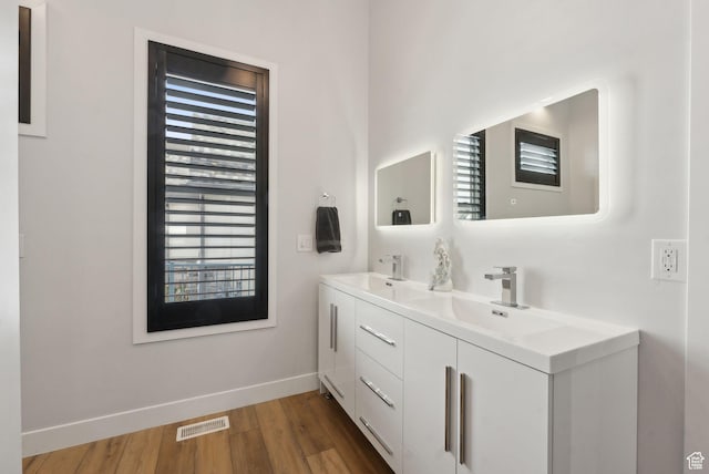 13599 S White Pony Rd W, Herriman, UT 84096 - bathroom with vanity and hardwood / wood-style floors