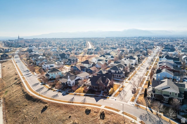 aerial view featuring a mountain view and a residential view
