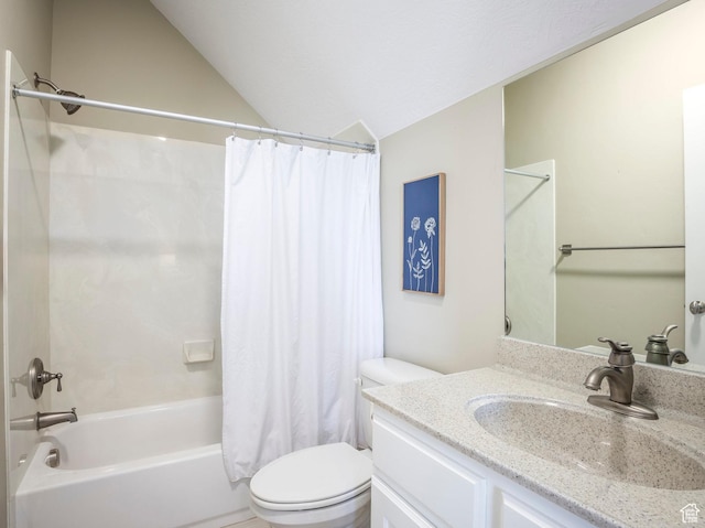 bathroom featuring vanity, toilet, shower / tub combo, and vaulted ceiling