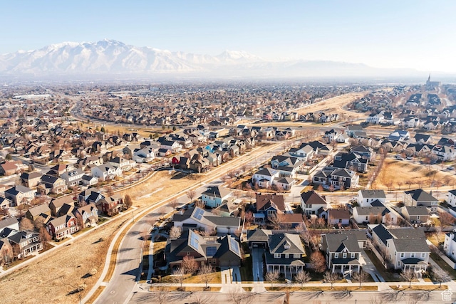 drone / aerial view featuring a mountain view and a residential view