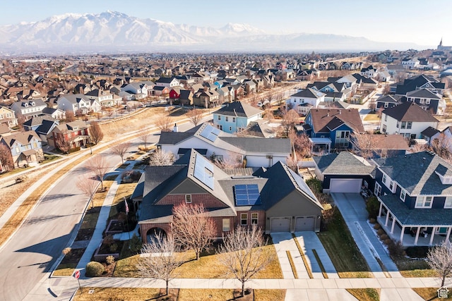 birds eye view of property featuring a mountain view and a residential view