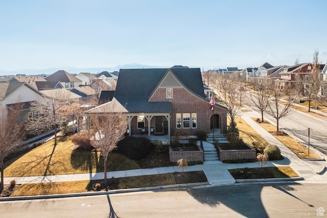 view of front of home with a residential view